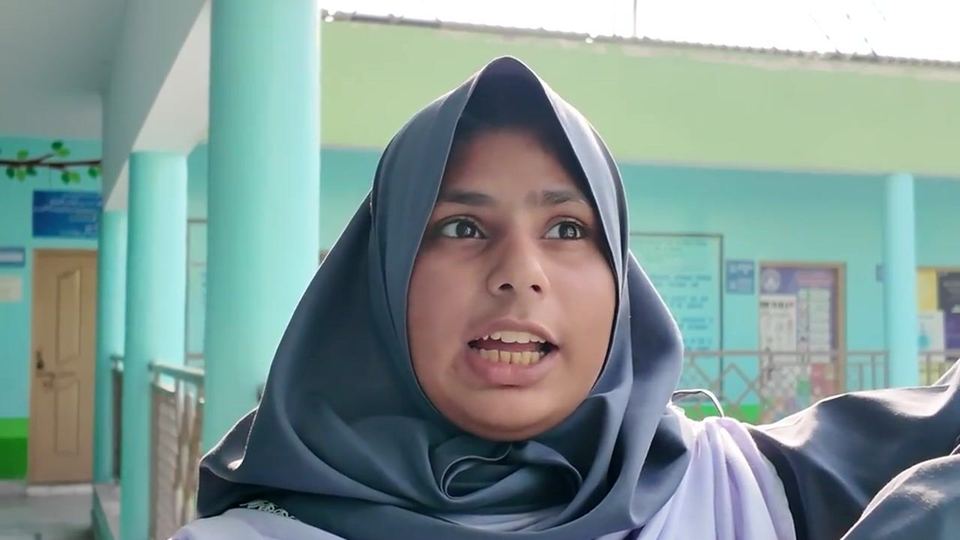 A sponsored student talks about her school